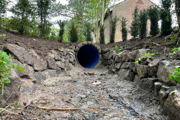 Drainage culvert outfall with stone headwall installed by S & C Shone